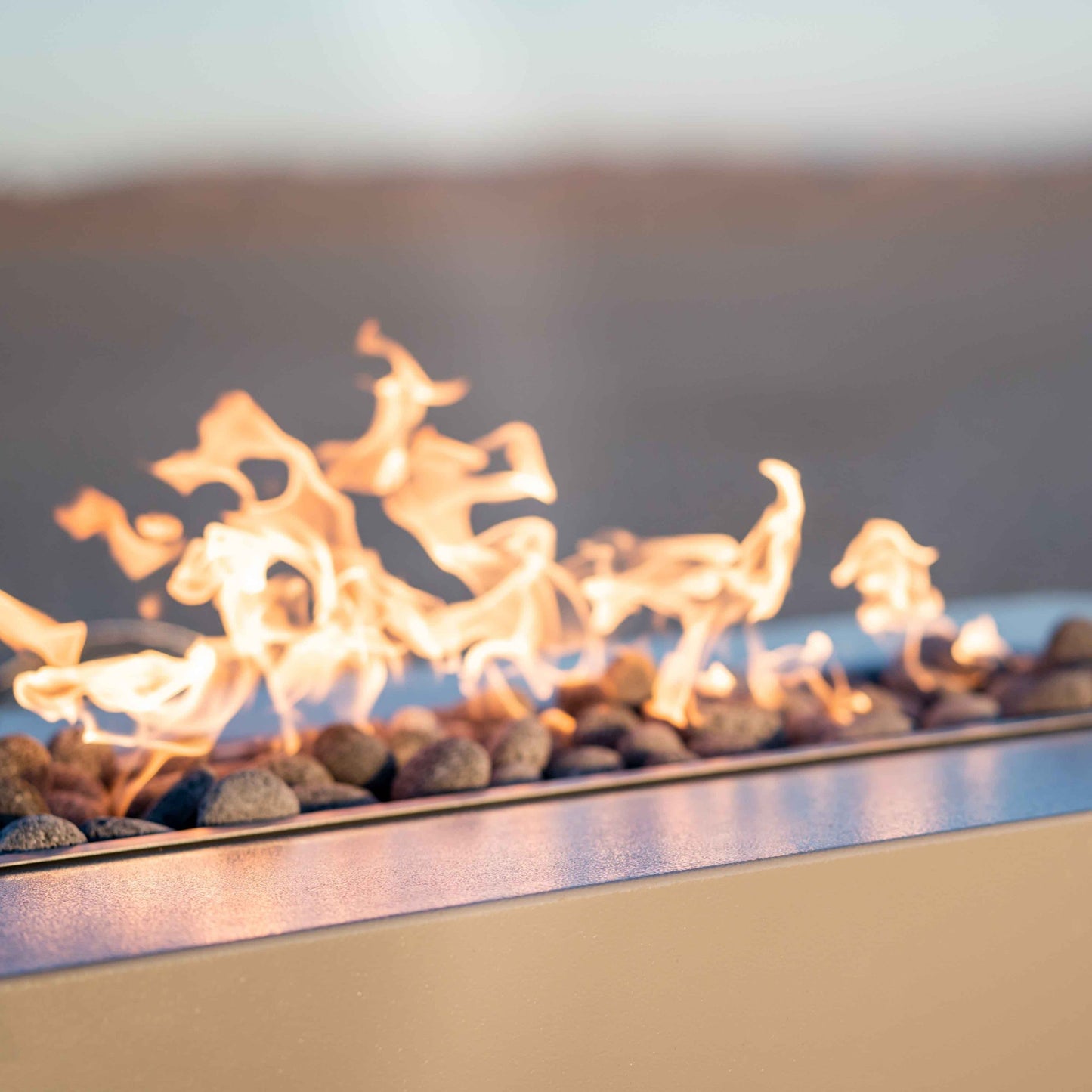 The Outdoor Plus Coronado 48" Powder-Coated Copper Vein Flame Sense System Linear Fire Pit with Push Button Spark Ignition